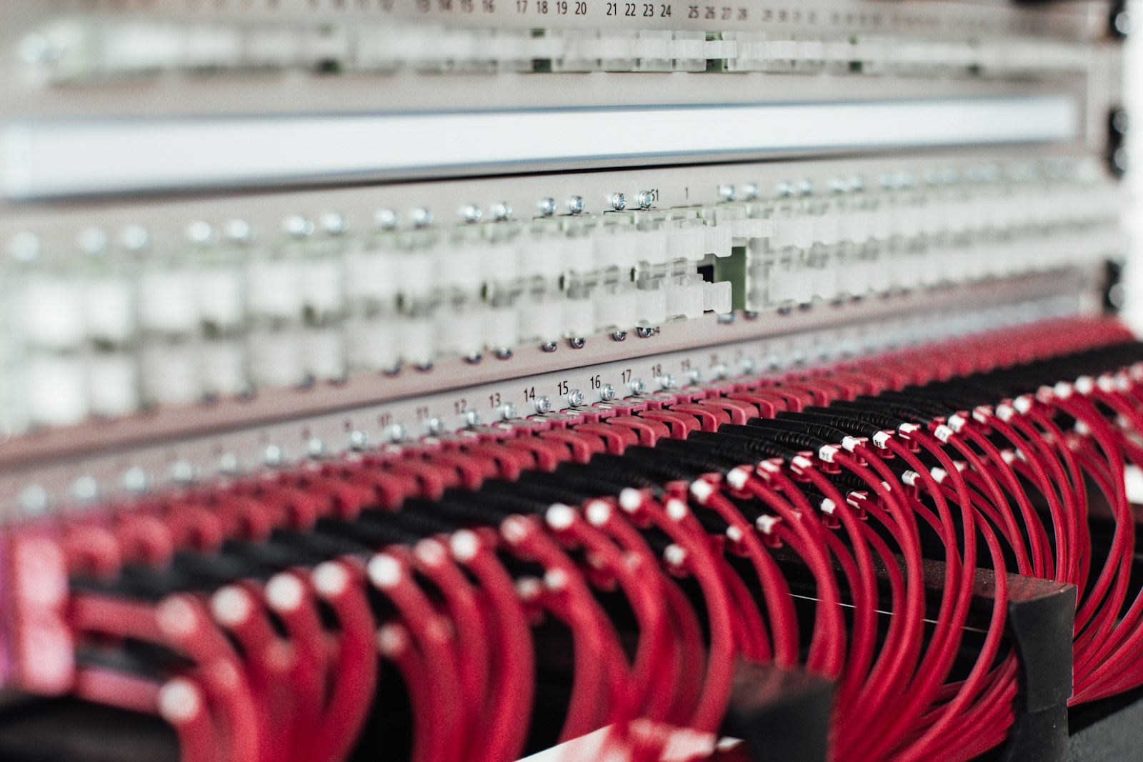 Fiber-optic infrastructure glowing in a data center
